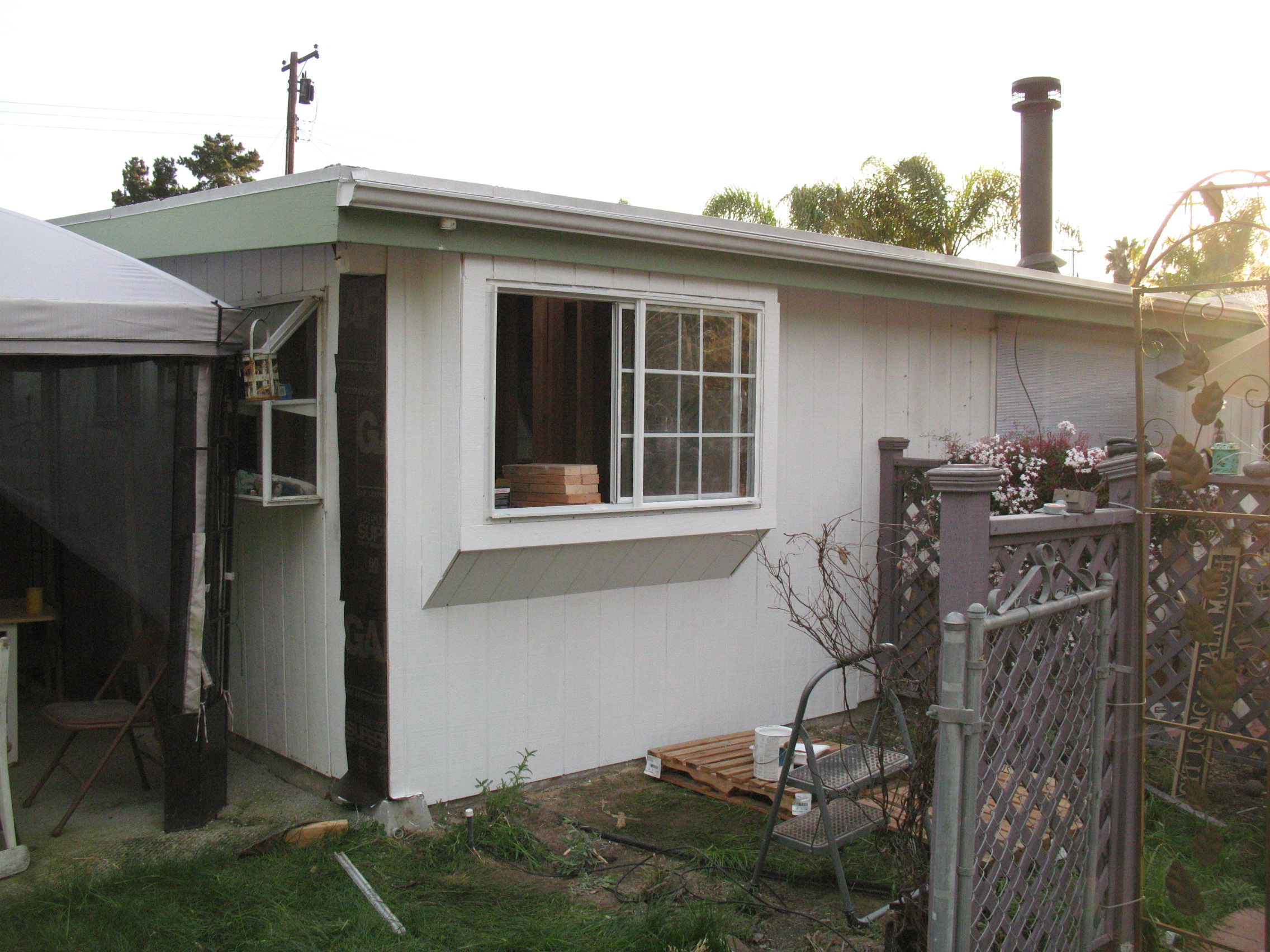 Finishing Pop Out Window Installation